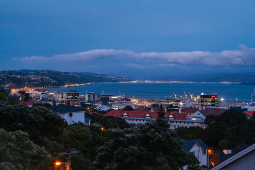 View over Wellington skyline and harbour at dusk from near Carter Observatory and Cable Car in Wellington, New Zealand