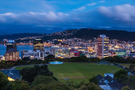 View over Wellington skyline and harbour at dusk from near Carter Observatory and Cable Car in Wellington, New Zealand
