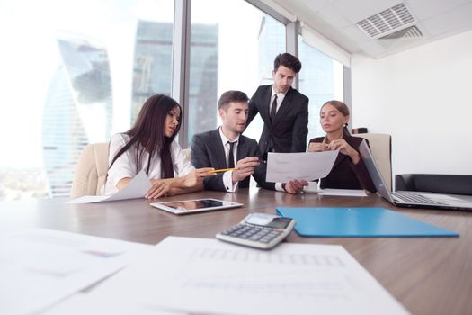 Business people working together at a meeting in modern office