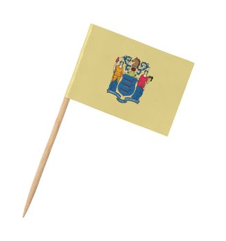 Small paper US-state flag on wooden stick - New Jersey - Isolated on white