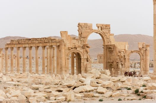 Palmyre Syria 2009 This ancient site has many Roman ruins, these standing columns shot in late afternoon sun with the citadel on the hill in the background . High quality photo