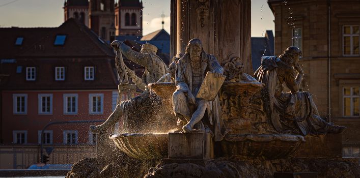 Old fountain in town of Wurzburg, Bavaria, Germany. Architecture and travel in Europe