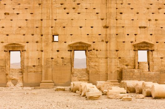 Palmyre Syria 2009 This ancient site has many Roman ruins, these standing columns shot in late afternoon sun with the citadel on the hill in the background . High quality photo