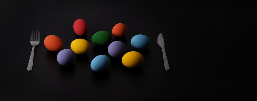 Multi-colorful of easter eggs on background in studio with close-up shot which include many colour such as yellow, green, blue, purple, red covered on eggs by art painting