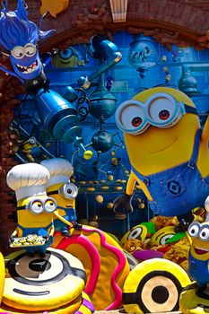 OSAKA, JAPAN - June 17, 2020 : Statue of HAPPY MINION easter version in Universal Studios Japan.Minions are famous character from Despicable Me animation.Universal Studios Japan reopening after COVID-19 quarantine.