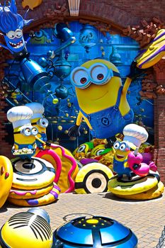 OSAKA, JAPAN - June 17, 2020 : Statue of HAPPY MINION easter version in Universal Studios Japan.Minions are famous character from Despicable Me animation.Universal Studios Japan reopening after COVID-19 quarantine.