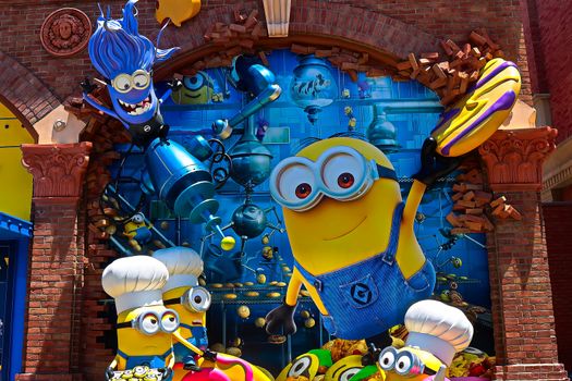 OSAKA, JAPAN - June 17, 2020 : Statue of HAPPY MINION easter version in Universal Studios Japan.Minions are famous character from Despicable Me animation.Universal Studios Japan reopening after COVID-19 quarantine.