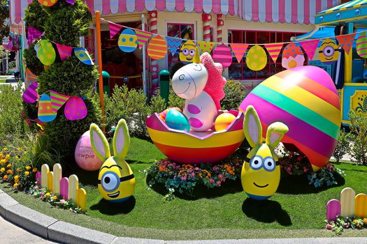 OSAKA, JAPAN - June 17, 2020 : Statue of HAPPY MINION easter version in Universal Studios Japan.Minions are famous character from Despicable Me animation.Universal Studios Japan reopening after COVID-19 quarantine.