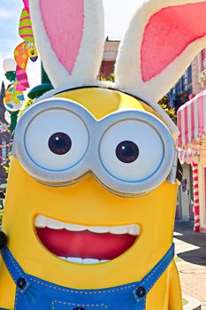 OSAKA, JAPAN - June 17, 2020 : Statue of HAPPY MINION easter version in Universal Studios Japan.Minions are famous character from Despicable Me animation.Universal Studios Japan reopening after COVID-19 quarantine.