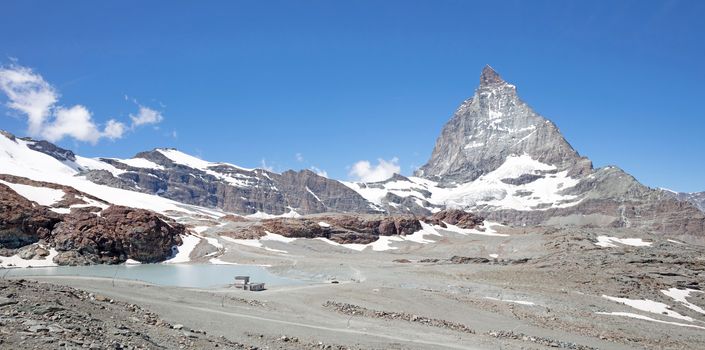 The Matterhorn, the iconic emblem of the Swiss Alps, summertime