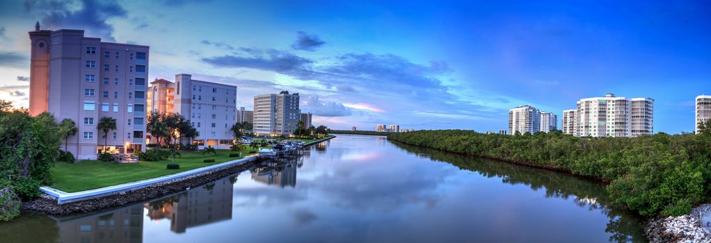 Calm water at sunset over Wiggins Pass on the riverway out to Delnor Wiggins State Park in Naples, Florida.