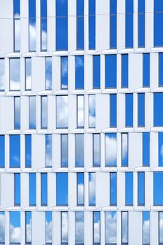 Close up glass windows of office building