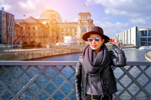 Woman portrait in Berlin and Reichstag building background