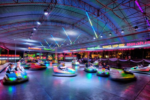 KHONKAEN THAILAND - JAN 27 2017: People with bumper cars at Mai Festival on Jan 27, 2017 in Khonkaen, Thailand