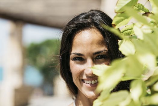Closeup portrait of a beautiful hispanic woman looking camera