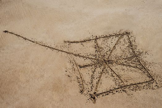 kite drawing in sand background