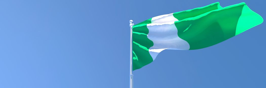 3D rendering of the national flag of Nigeria waving in the wind against a blue sky