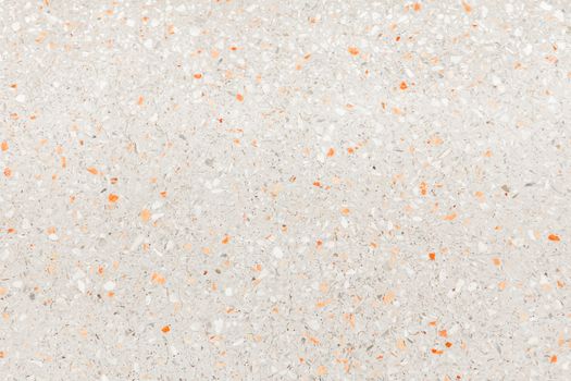 terrazzo flooring which has Orange rock Small or marble old. polished stone wall beautiful texture for background with copy space add text