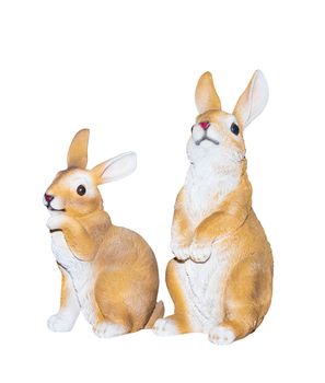 Two rabbits dolly toy is standing isolated on a white background