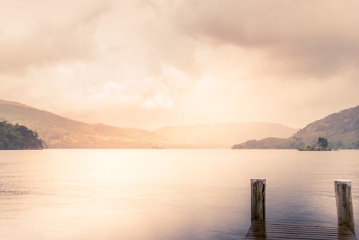 view of stormy skies north east across ullswater from glenridding