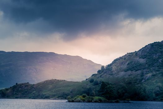 view of stormy skies north east across ullswater from glenridding