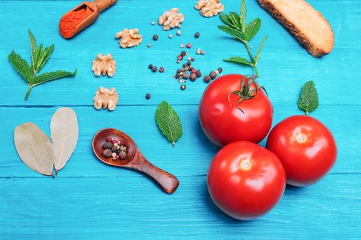 vegetables, pepper, nuts on a wooden table