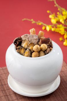 Traditional food of Chinese lunar new year, Buddha jumps over the wall, Chinese Soup Casserole dish, Buddha's Temptation, named Fo Tiao Qiang, close up.