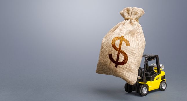 Forklift carrying a dollar money bag. Anti-crisis budget. Borrowing on capital market. Stimulating economy. Subsidies soft loans. Investments. Strongest financial assistance, business support.