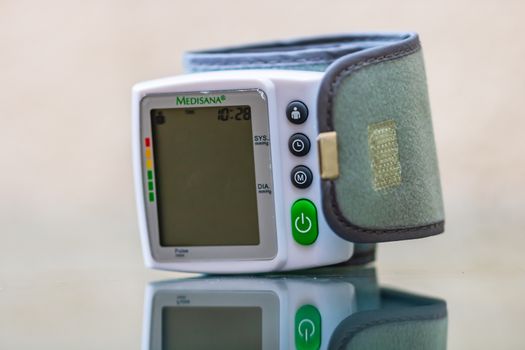 Close up, detail of blood pressure cuff monitor isolated. Digital blood pressure measuring device. Bucharest, Romania, 2020.