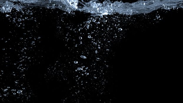 Blurry images of soda liquid water bubbles or carbonate drink or oil shape or beer fizzing or splashing and floating drop in black background for represent sparkling and refreshing