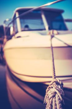 Retro Styled Image Of A Luxury Yacht Moored In A Marina At Sunset In The Tropics