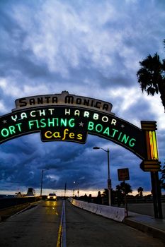 Los Angeles,CA/USA - Oct 29, 2015 : Welcoming arch in Santa Monica, California. The city has 3.5 miles of beach locations.Santa Monica Pier, Picture of the entrance with the famous arch sign.