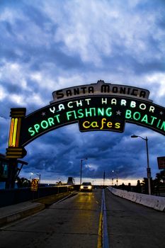 Los Angeles,CA/USA - Oct 29, 2015 : Welcoming arch in Santa Monica, California. The city has 3.5 miles of beach locations.Santa Monica Pier, Picture of the entrance with the famous arch sign.