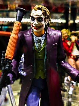 Osaka, Japan - Apr 23, 2019: Focused on fictional character figure from DC comics BATMAN The Dark Knight Joker figure out of toys shop.This figure 15cm size model.