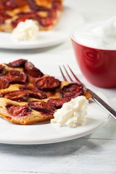 slice of bavarian plumcake with cream