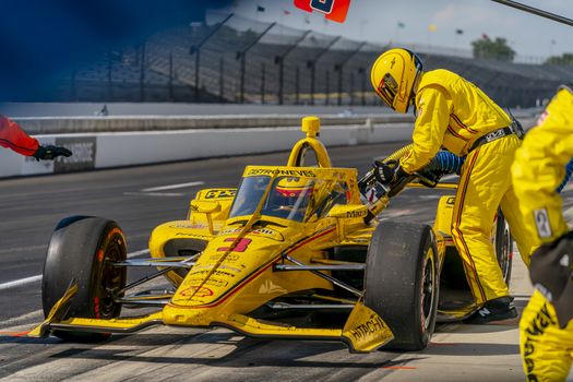 HELIO CASTRONEVES (3) of Brazil brings his car in for service during the Indianapolis 500 at Indianapolis Motor Speedway in Indianapolis Indiana.