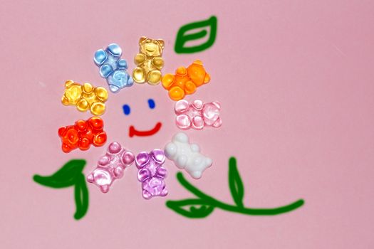 flower of colorful bears with a smile symbolizing friendship of peoples, copy space