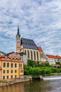 St Vitus church in the middle of historical city centre. View from Vltava River. Cesky Krumlov, Southern Bohemia, Czech.