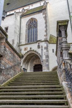 stairs and entrance to St. Vitus church in Cesky Krumlov without people