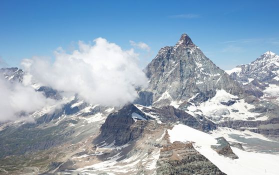 The Matterhorn, the iconic emblem of the Swiss Alps, summertime