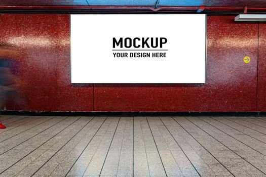 Blank billboard located in underground hall or subway for advertising, mockup concept, Low light speed shutter