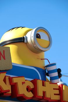 OSAKA, JAPAN - Feb 19, 2020 : Statue of "HAPPY MINION", located in Universal Studios Japan, Osaka, Japan. Minions are famous character from Despicable Me animation.