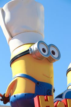 OSAKA, JAPAN - Feb 19, 2020 : Statue of "HAPPY MINION", located in Universal Studios Japan, Osaka, Japan. Minions are famous character from Despicable Me animation.