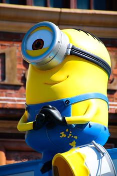 OSAKA, JAPAN - Feb 19, 2020 : Statue of "HAPPY MINION", located in Universal Studios Japan, Osaka, Japan. Minions are famous character from Despicable Me animation.