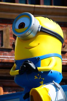 OSAKA, JAPAN - Feb 19, 2020 : Statue of "HAPPY MINION", located in Universal Studios Japan, Osaka, Japan. Minions are famous character from Despicable Me animation.