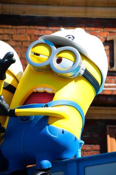 OSAKA, JAPAN - Feb 19, 2020 : Statue of "HAPPY MINION", located in Universal Studios Japan, Osaka, Japan. Minions are famous character from Despicable Me animation.