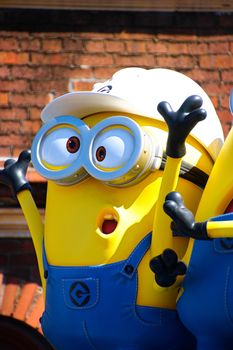 OSAKA, JAPAN - Feb 19, 2020 : Statue of "HAPPY MINION", located in Universal Studios Japan, Osaka, Japan. Minions are famous character from Despicable Me animation.