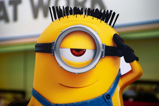 OSAKA, JAPAN - Feb 19, 2020 : Statue of "HAPPY MINION", located in Universal Studios Japan, Osaka, Japan. Minions are famous character from Despicable Me animation.