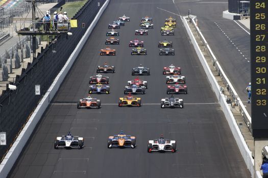 The green flag drops on the Indianapolis 500 at Indianapolis Motor Speedway in Indianapolis Indiana.