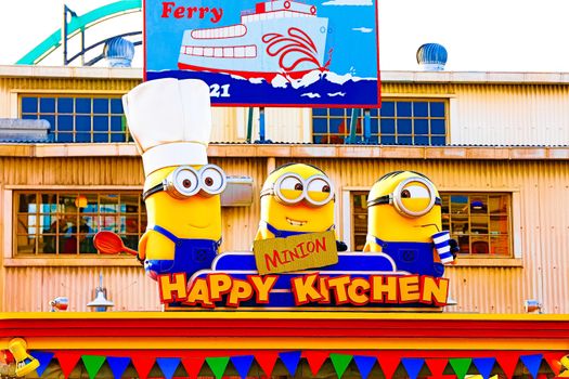 OSAKA, JAPAN - Nov 13, 2019 : Close up HAPPY MINION statue in Universal Studios Japan. Minions are famous character from Despicable Me animation.